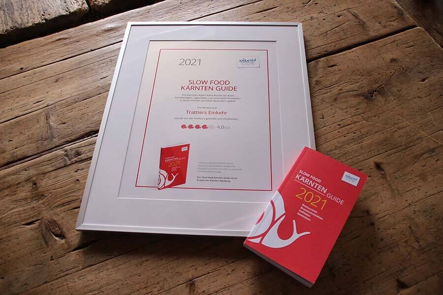 Award from the Slow Food Carinthia Guide is in a silver picture frame